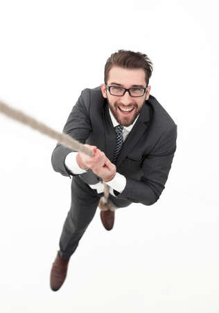 successful businessman climbing the rope