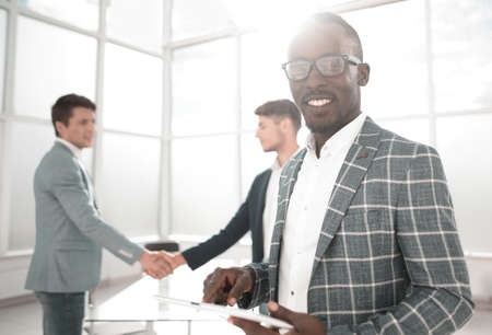 close up.young businessman standing in the office