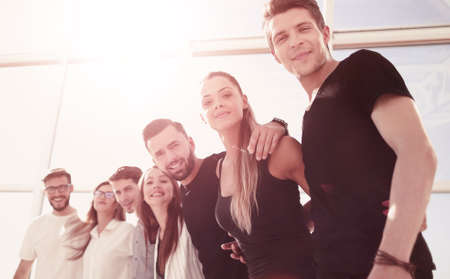 happy business team standing in bright office.の写真素材