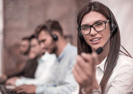 close up.call center employee pointing at youの写真素材