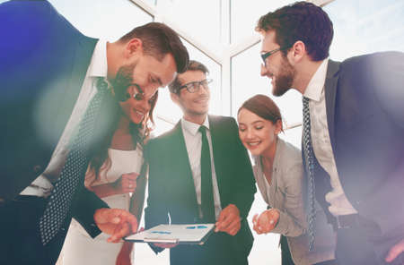 Manager shows the business team the financial reporの写真素材