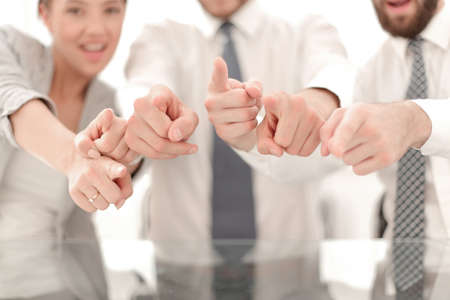 close up.a group of young men pointing at youの写真素材