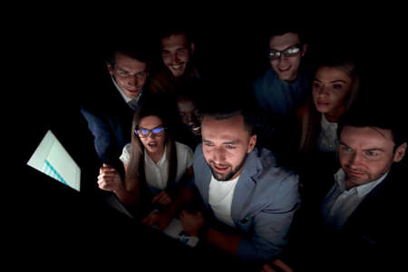 close up.a involved group of young people looking at a computer screen.の写真素材