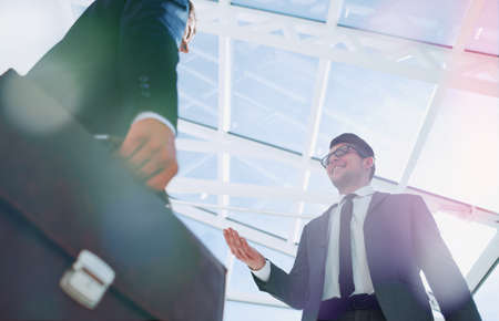 Detail of a businessman holding his briefcaseの写真素材