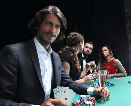 friends drinking and celebrating a gambling night