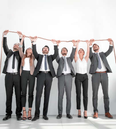 business team holding strong rope.の写真素材