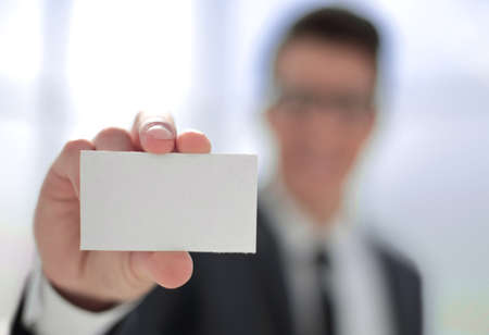 close up.business card in the hands of a businessman.の写真素材