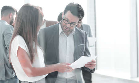 boss and assistant to discuss the work schedule