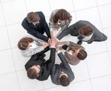 top view.business team joining hands togetherの写真素材