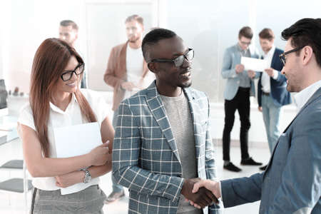 business partners discuss the document