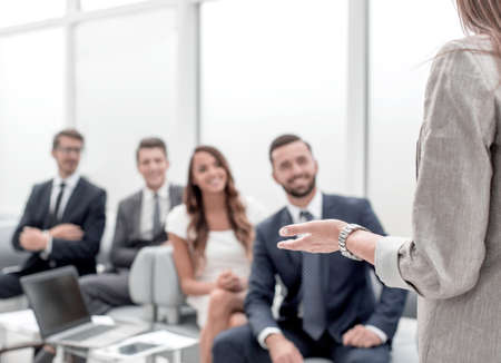 business woman makes a report for the business team