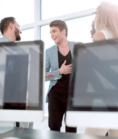 staff members speak during a work break
