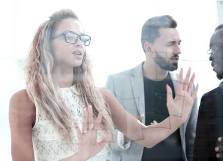 close up.business colleagues discussing marketing schemes