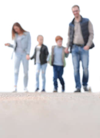 in full growth.young family with their children walking togethe