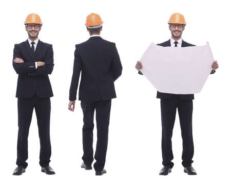 in full growth .a qualified architect in an orange helmet