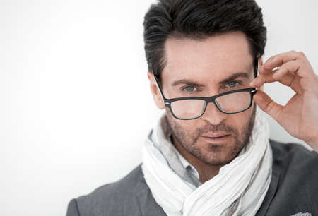 Close up. businessman touching his glasses.の写真素材