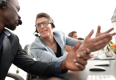 operators of the call center discussing operational issues