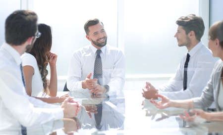 hrough the glass.the business team is holding a meetingの写真素材