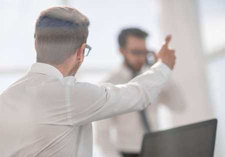 young businessman showing his successの写真素材