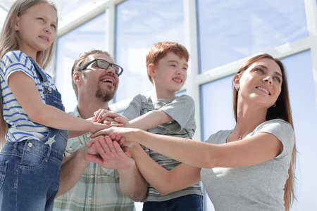close up. a happy family looks forward to somethingの写真素材