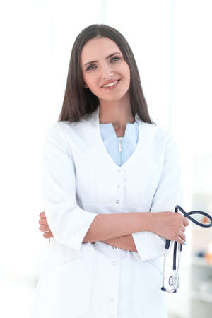 close up. confident woman doctor with stethoscope .の写真素材