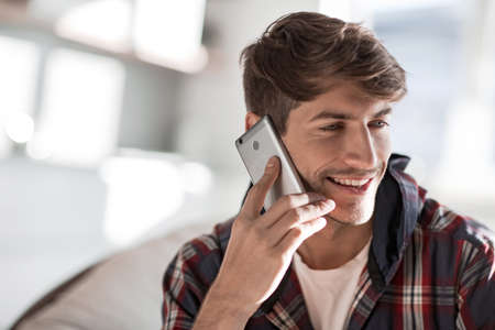 close up. young man talking on the phone