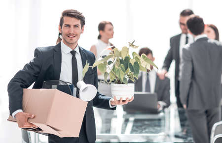 young employee on the background of the new office
