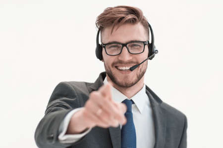 close up.smiling call center operator pointing at youの写真素材