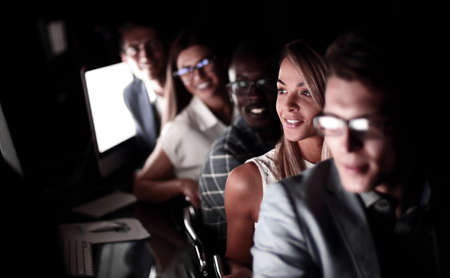 close up.a group of employees sitting in the computer roomの写真素材