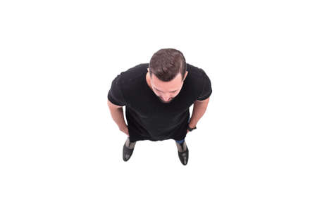 top view. confident young man. isolated on whiteの写真素材