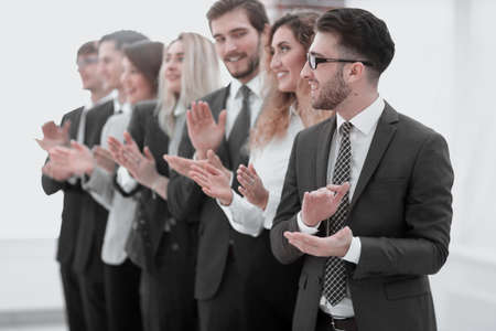 group of business people applauding isolatedの写真素材