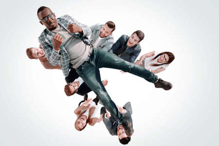 top view.business team throws up their leaderの写真素材