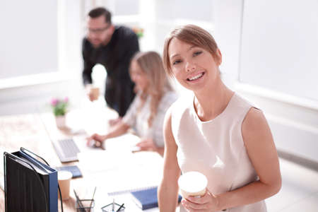 young business woman on the background of the officeの写真素材