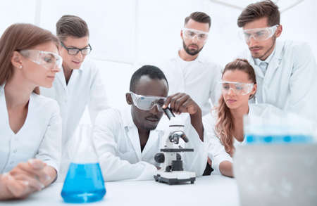 Group of young scientists working in the chemical laboratoryの写真素材