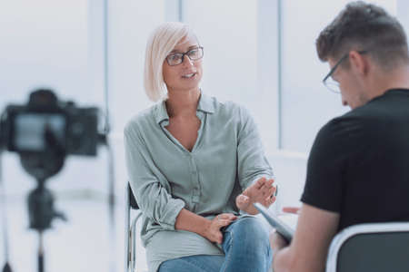 business people sitting in the Studio during the interview.の写真素材
