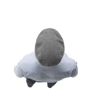 top view. a young man in a checkered cap