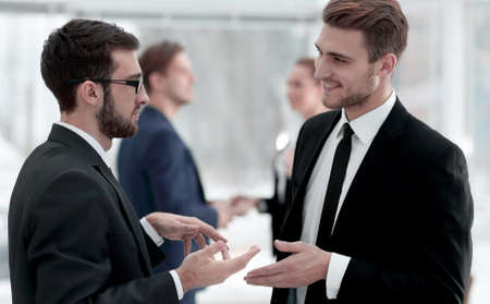 business colleagues talking in the officeの写真素材