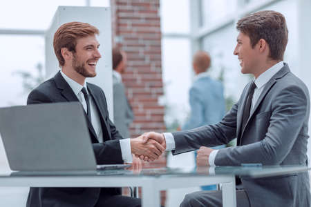 close up. business handshake at the negotiating tableの写真素材
