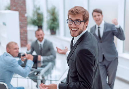 close up. smiling happy businessman looking at the cameraの写真素材