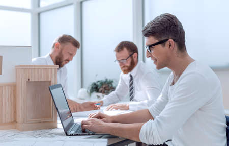 group of architects and designers are working on a new project.