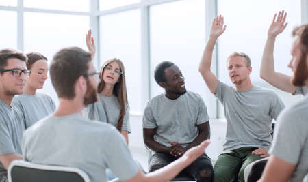 young people ask questions during the meeting