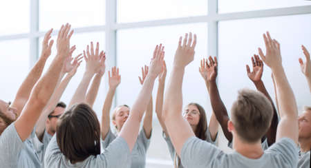 group of young people performing tasks in the classroom teambuilding