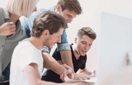 project Manager discussing with a team of business documents.の写真素材