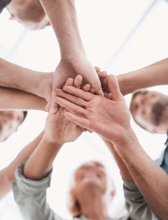close up. business team putting their hands togetherの写真素材