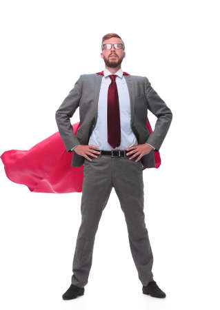 full length . confident superhero businessman in a red Capeの写真素材