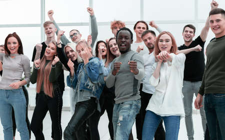 close up. a fun group of friends standing togetherの写真素材