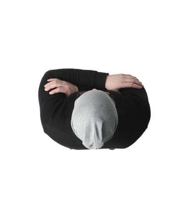 top view. optimistic modern man looking at the camera.isolated on white backgroundの写真素材