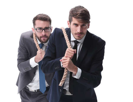 full length . two businessmen pulling a long rope.