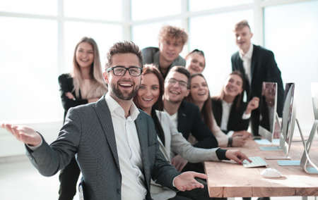 young businessman and business team in the workplace.の写真素材