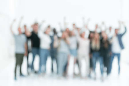 blurry image of a group of diverse young people . business backgroundの写真素材